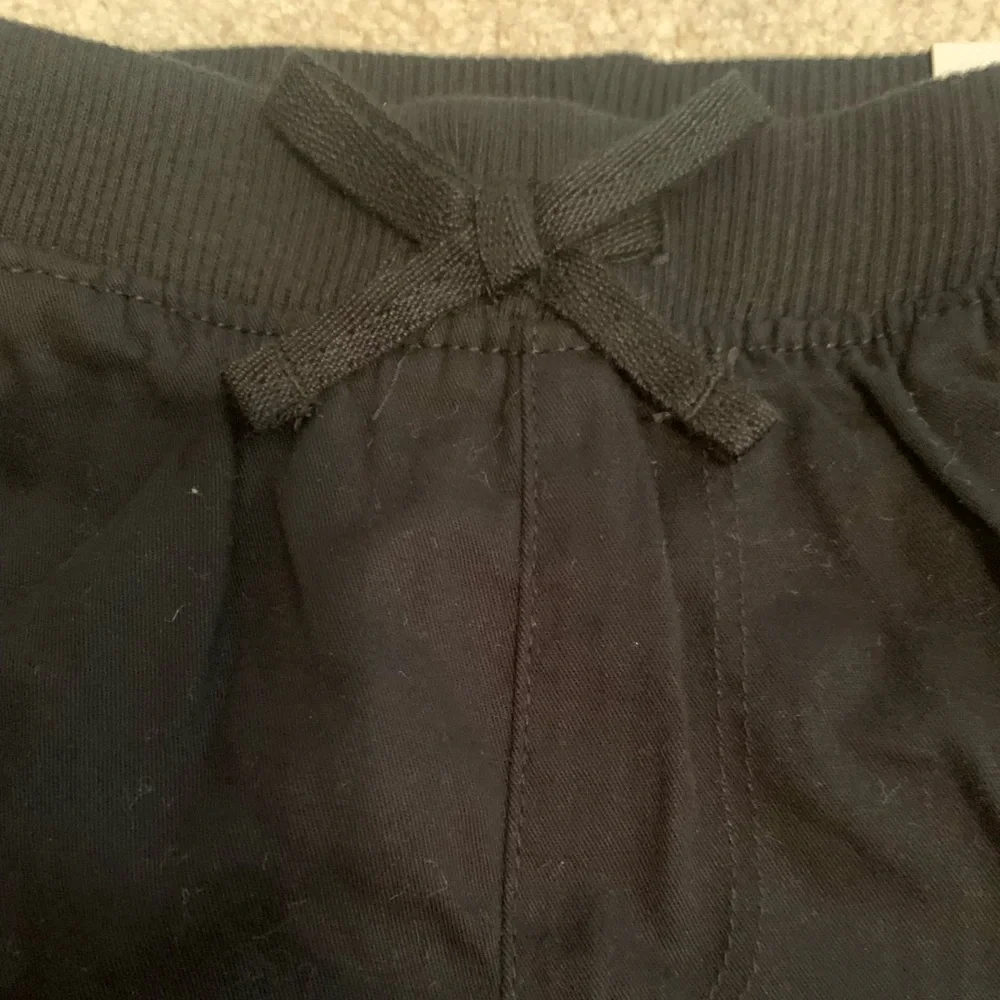 NWT The Children’s Place kids black shorts. Size 5T.